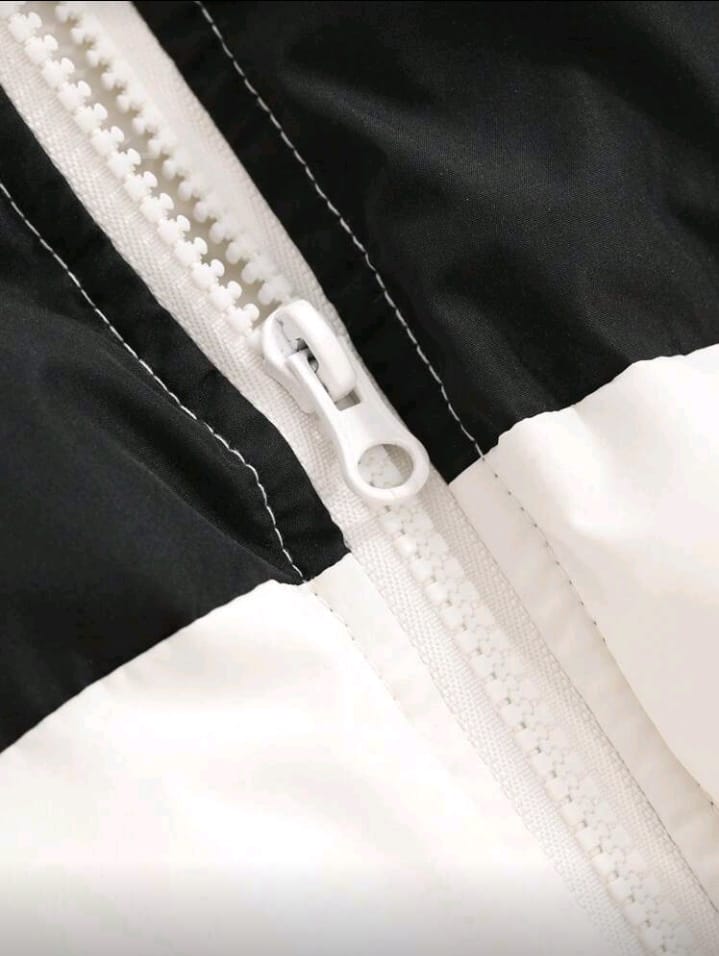 Color Block High-Neck Puffer Jacket in Black and White